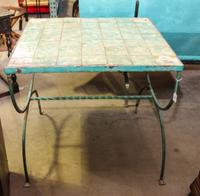 A French Tile Inset Wrought Iron Baker's Table Height 27 1/2 x width 29 1/2 x depth 29 1/2 inches.