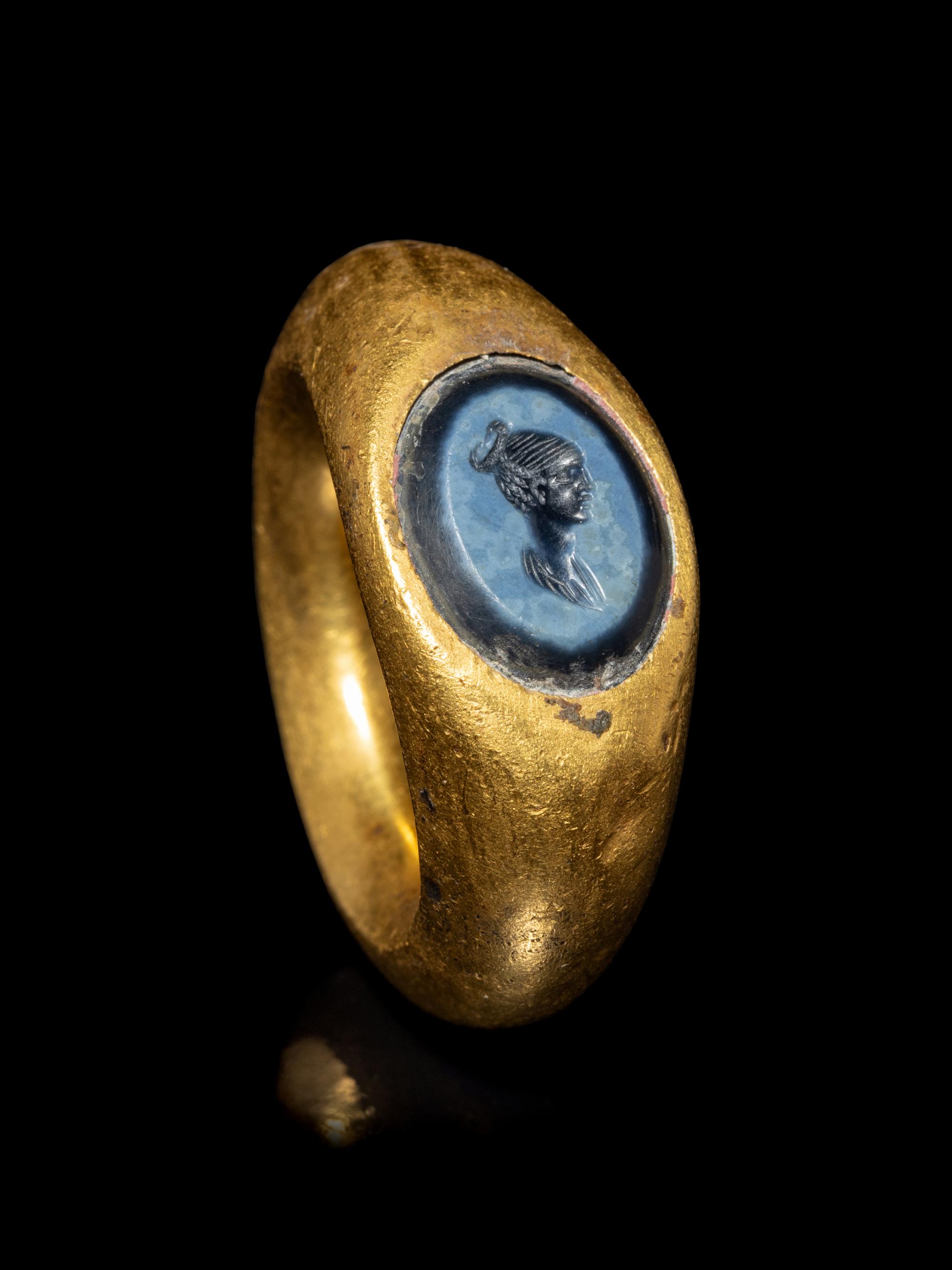 A Roman Gold and Nicolo Finger Ring with a Female Portrait Head