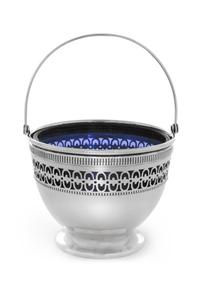 An American Silver Nut Dish, Webster Co., North Attleboro, MA, having a swinging handle surmounting a pierce decorated body with a blue