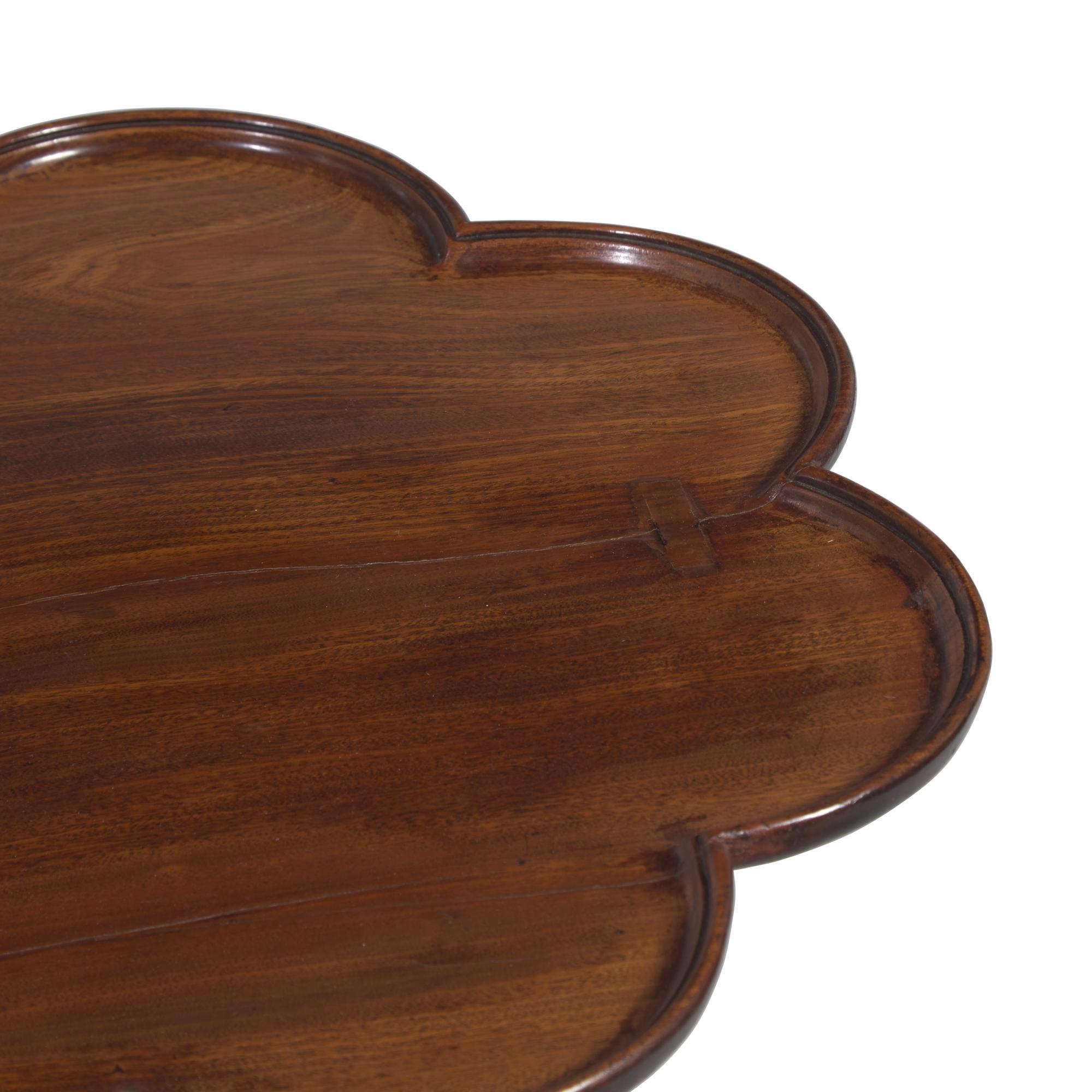 A Chippendale Carved Mahogany Scalloped-Top Candlestand
