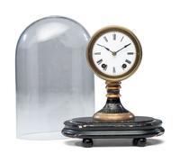 An Ebonized and Parcel Gilt Mantel Clock