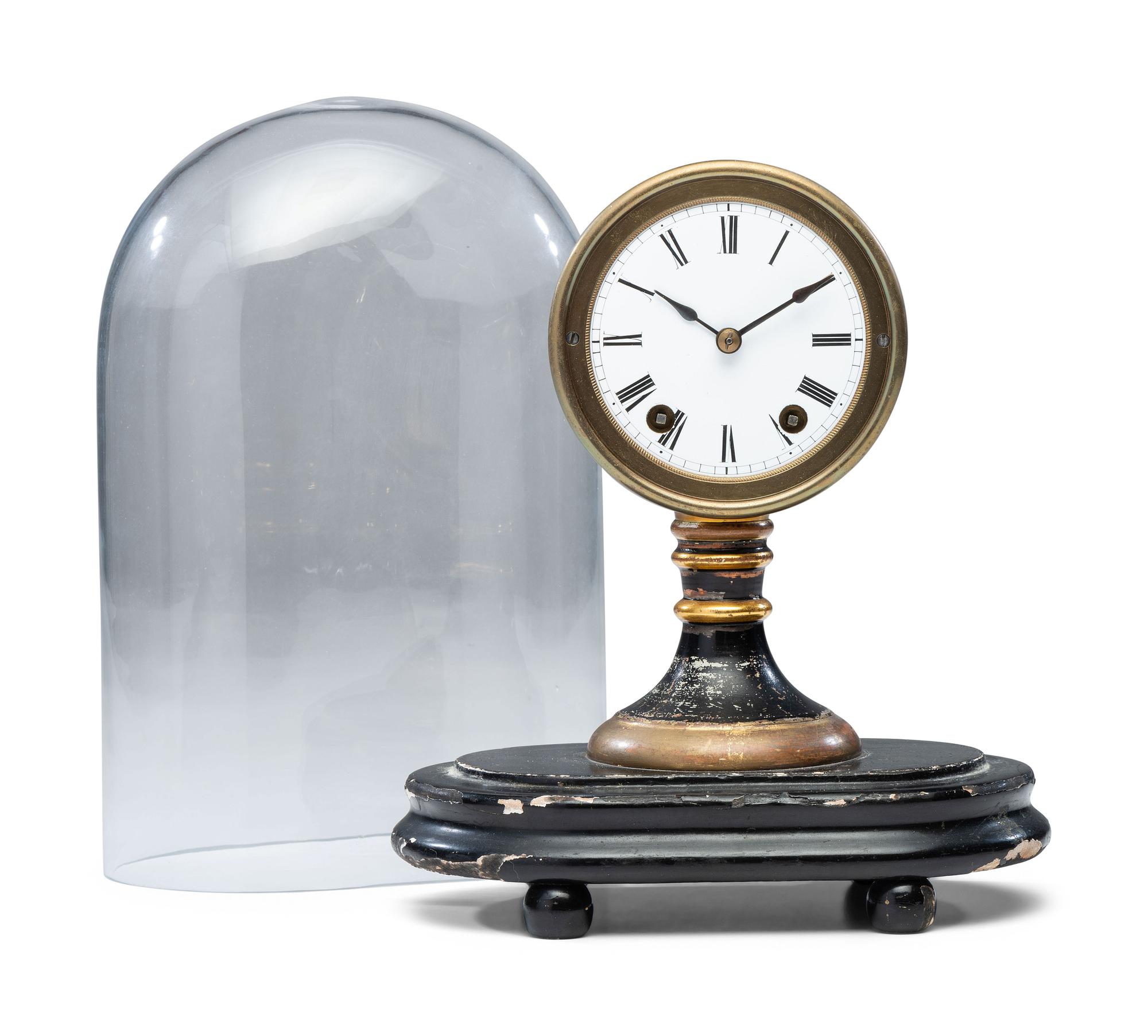 An Ebonized and Parcel Gilt Mantel Clock