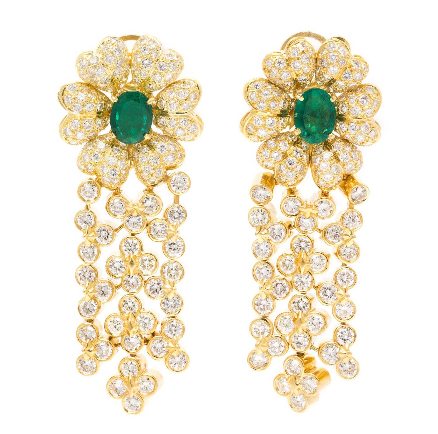 A Pair of 18 Karat Yellow Gold, Diamond and Emerald Floral Motif Earclips, 28.40 dwts.