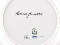 A Set of Twelve Royal Copenhagen Parcel Gilt Porcelain Fish Plates