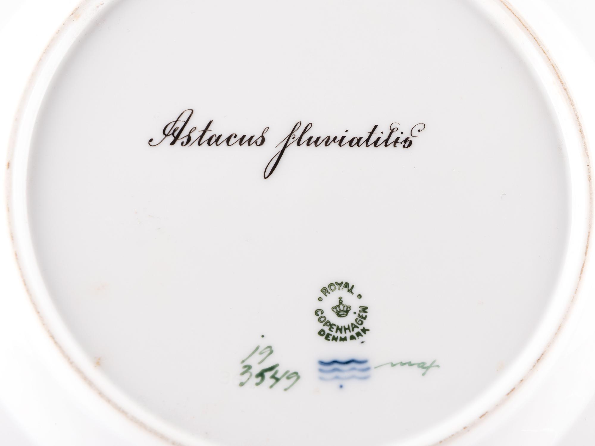 A Set of Twelve Royal Copenhagen Parcel Gilt Porcelain Fish Plates