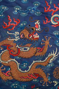 A Blue Ground Embroidered Silk Dragon Robe, Jifu