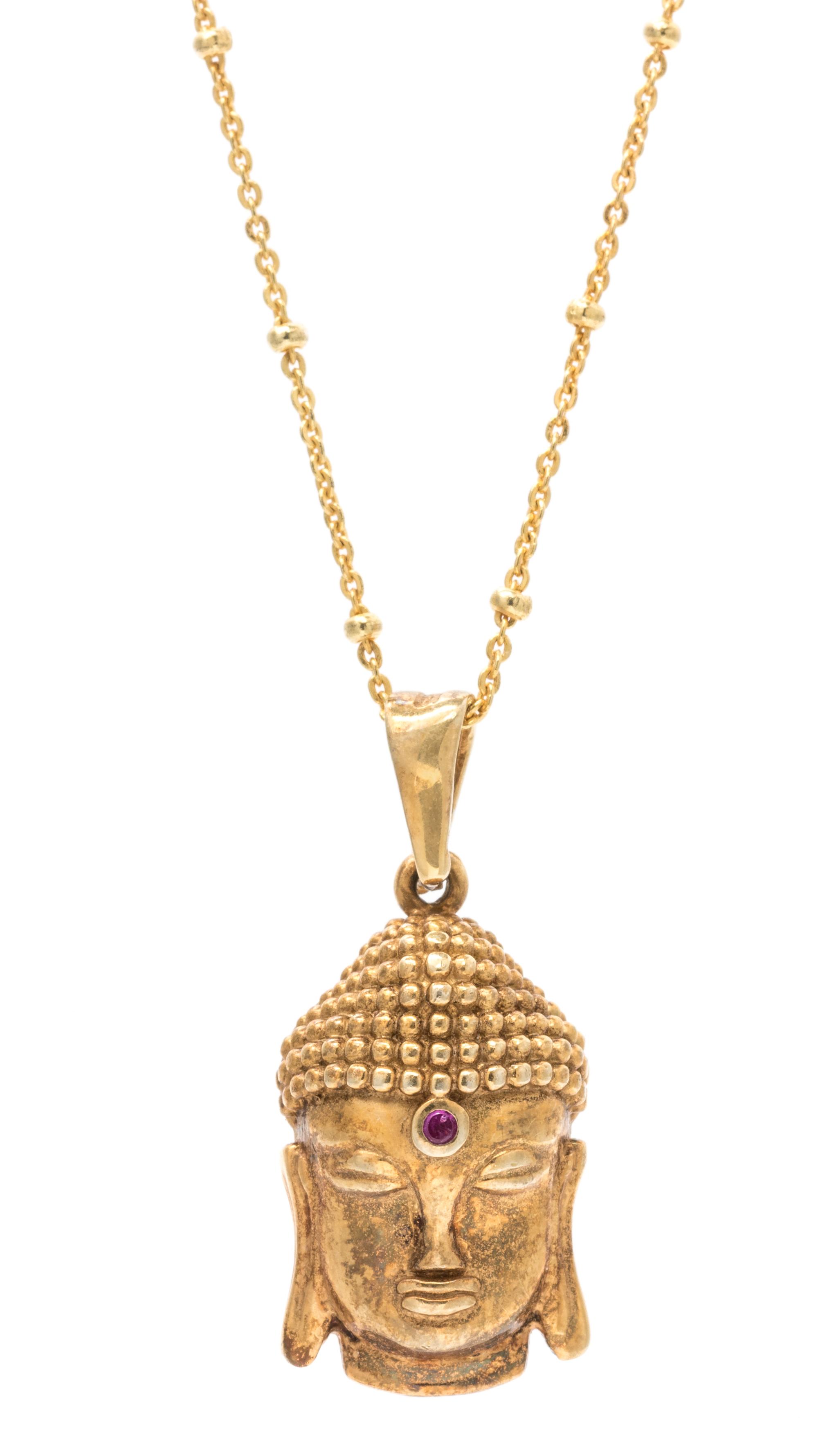 A Gilt Silver and Ruby Buddha Pendant and Chain, 5.10 dwts.