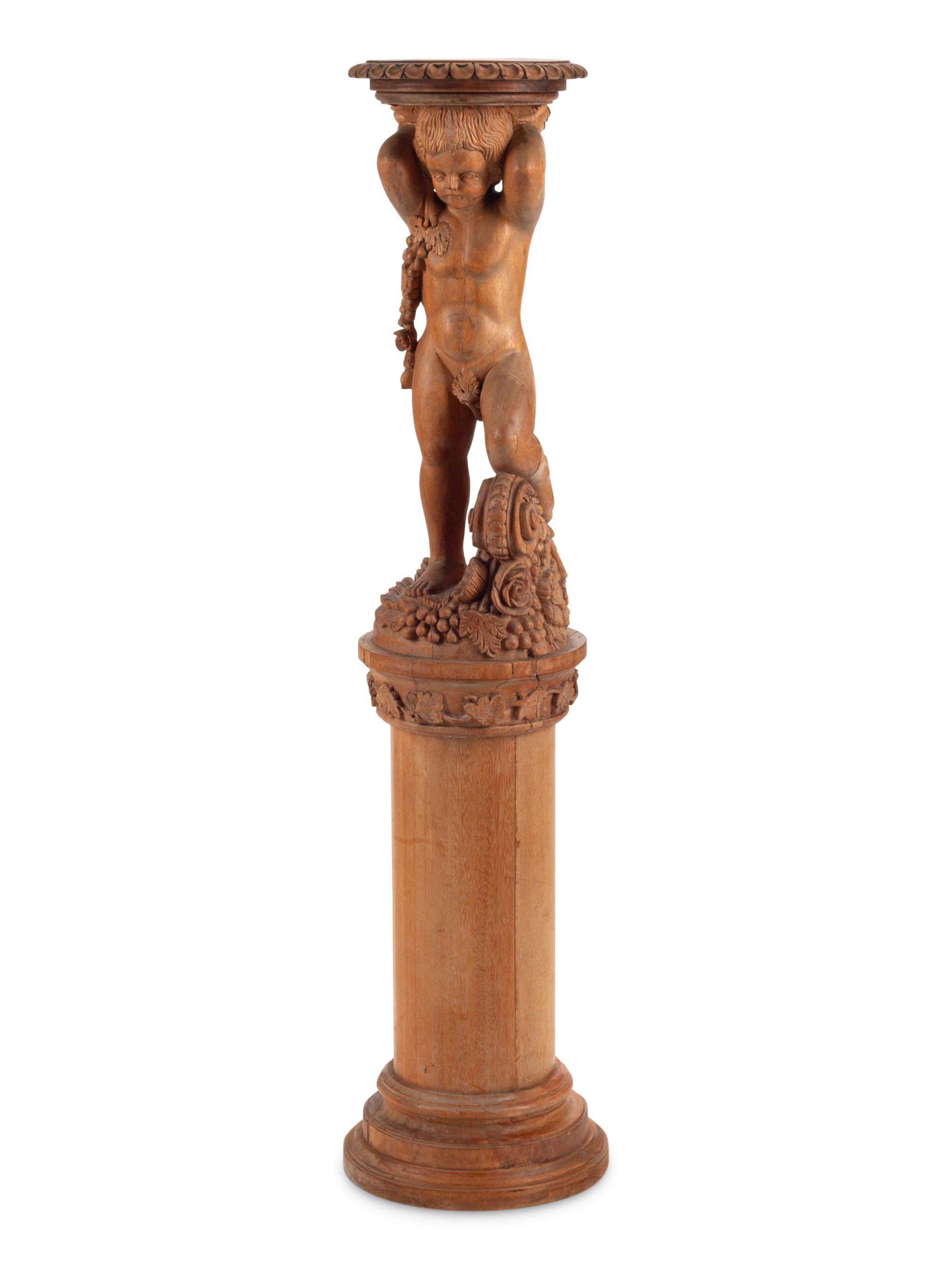 A Continental Carved Oak Figural Pedestal
