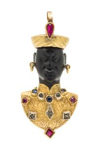 An 18 Karat Yellow Gold, Ebony, Ruby, Sapphire and Diamond Blackamoor Pendant, 8.30 dwts.