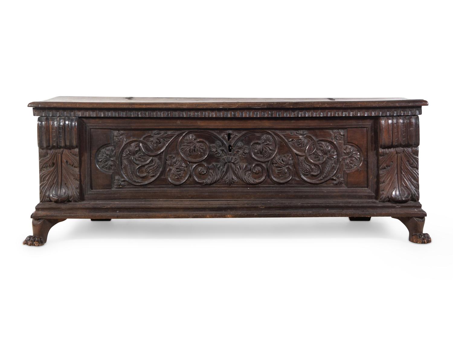 An Italian or Continental Carved Walnut Cassone