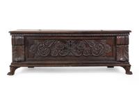 An Italian or Continental Carved Walnut Cassone