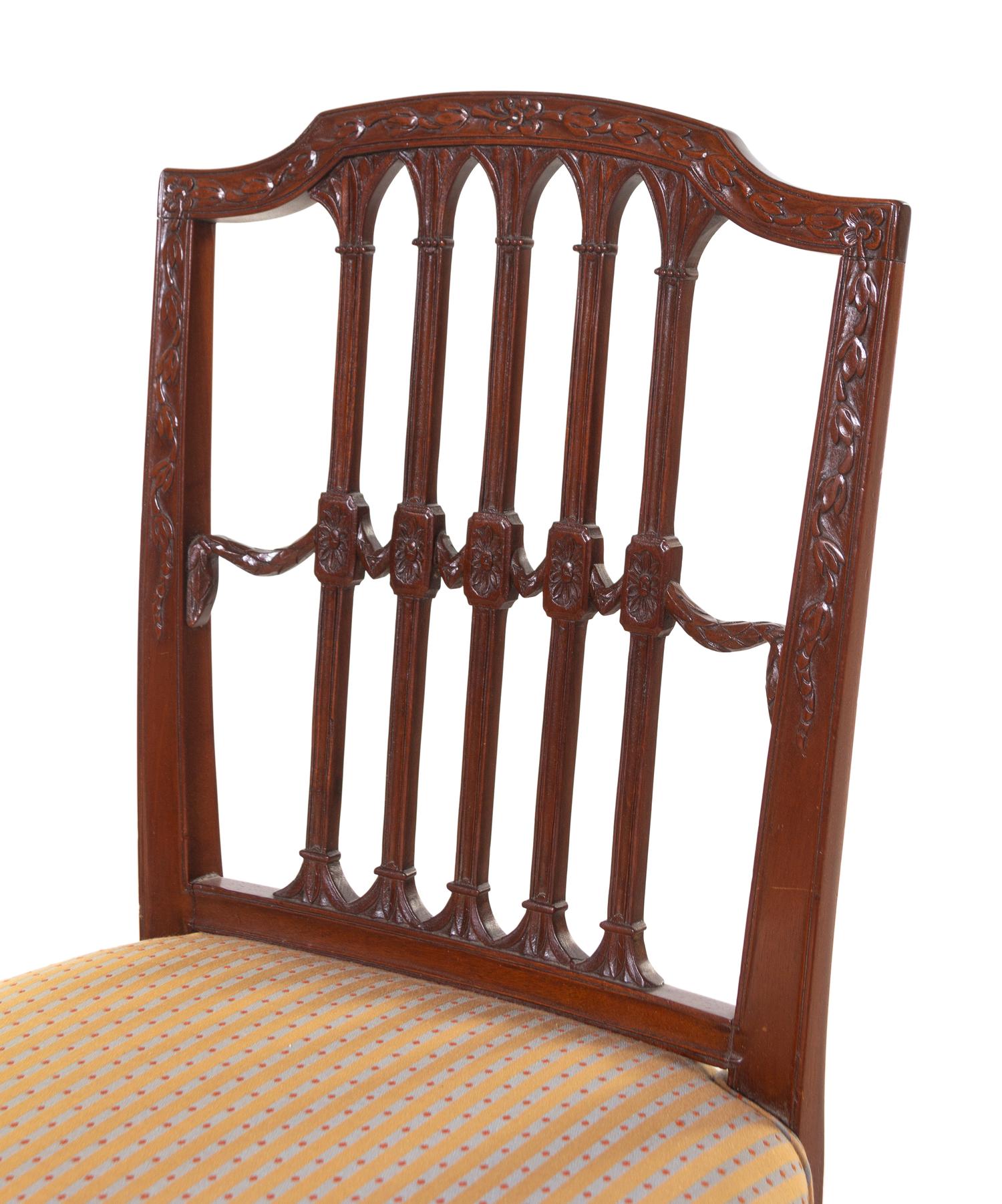 A Set of Six Regency Carved Mahogany Dining Chairs