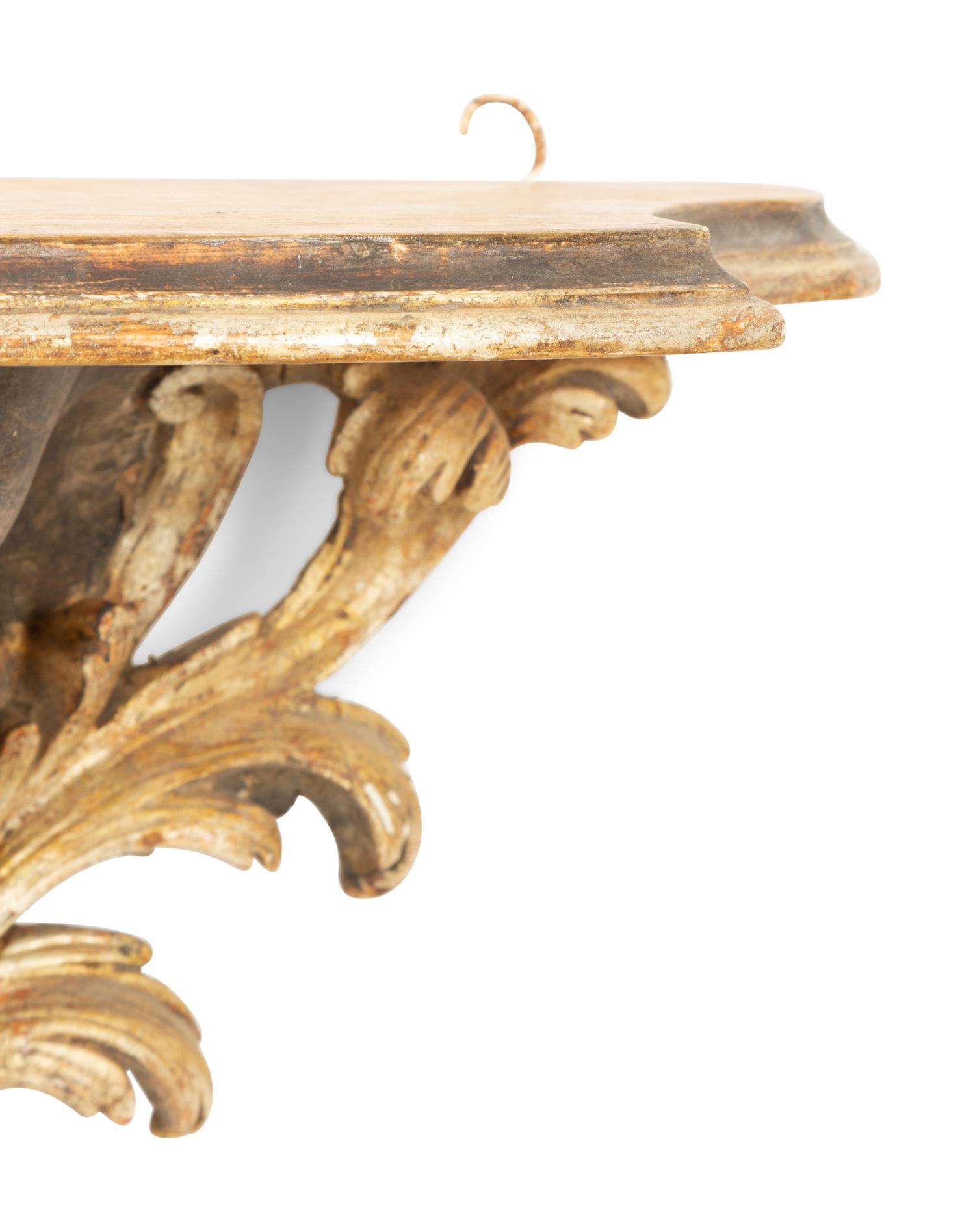 An Italian Rococo Style Carved and Painted Wall Bracket with Faux Marble Shelf