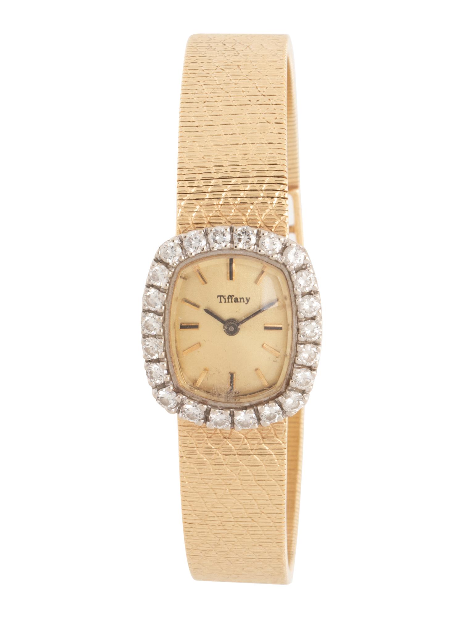 YELLOW GOLD AND DIAMOND WATCH