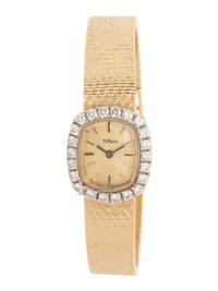 YELLOW GOLD AND DIAMOND WATCH