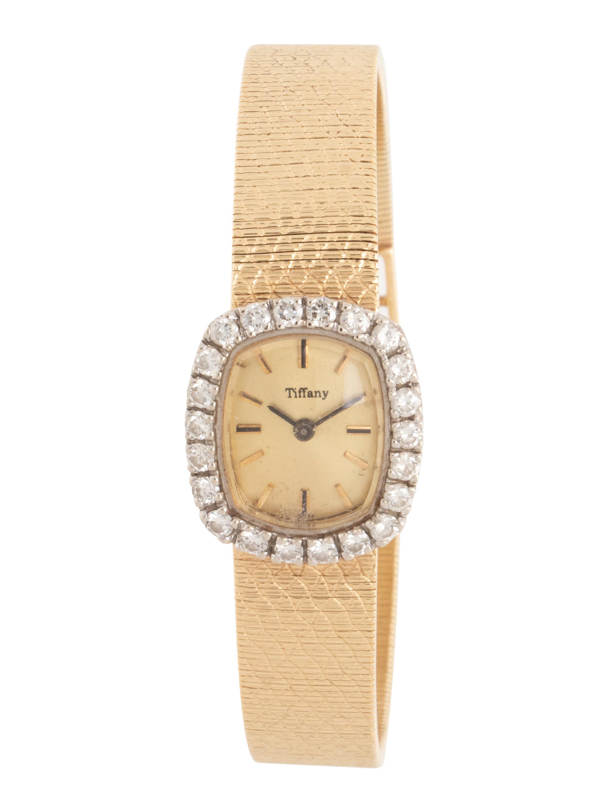 YELLOW GOLD AND DIAMOND WATCH