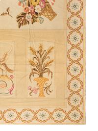 A Large Needlepoint Wool Rug