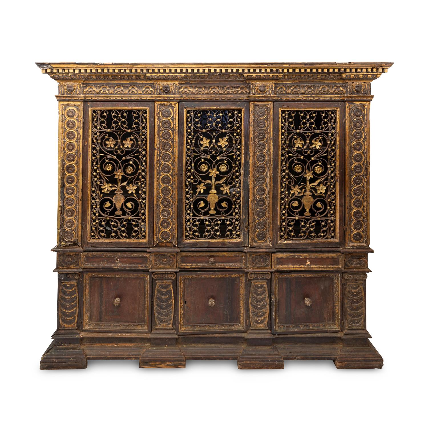 An Italian Iron-Mounted and Parcel Gilt Bookcase Supplied by Addison Mizner for the Everglades Club, Palm Beach