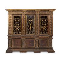 An Italian Iron-Mounted and Parcel Gilt Bookcase Supplied by Addison Mizner for the Everglades Club, Palm Beach