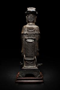 A Pair of Chinese Gilt Decorated Bronze Figures of Standing Officials