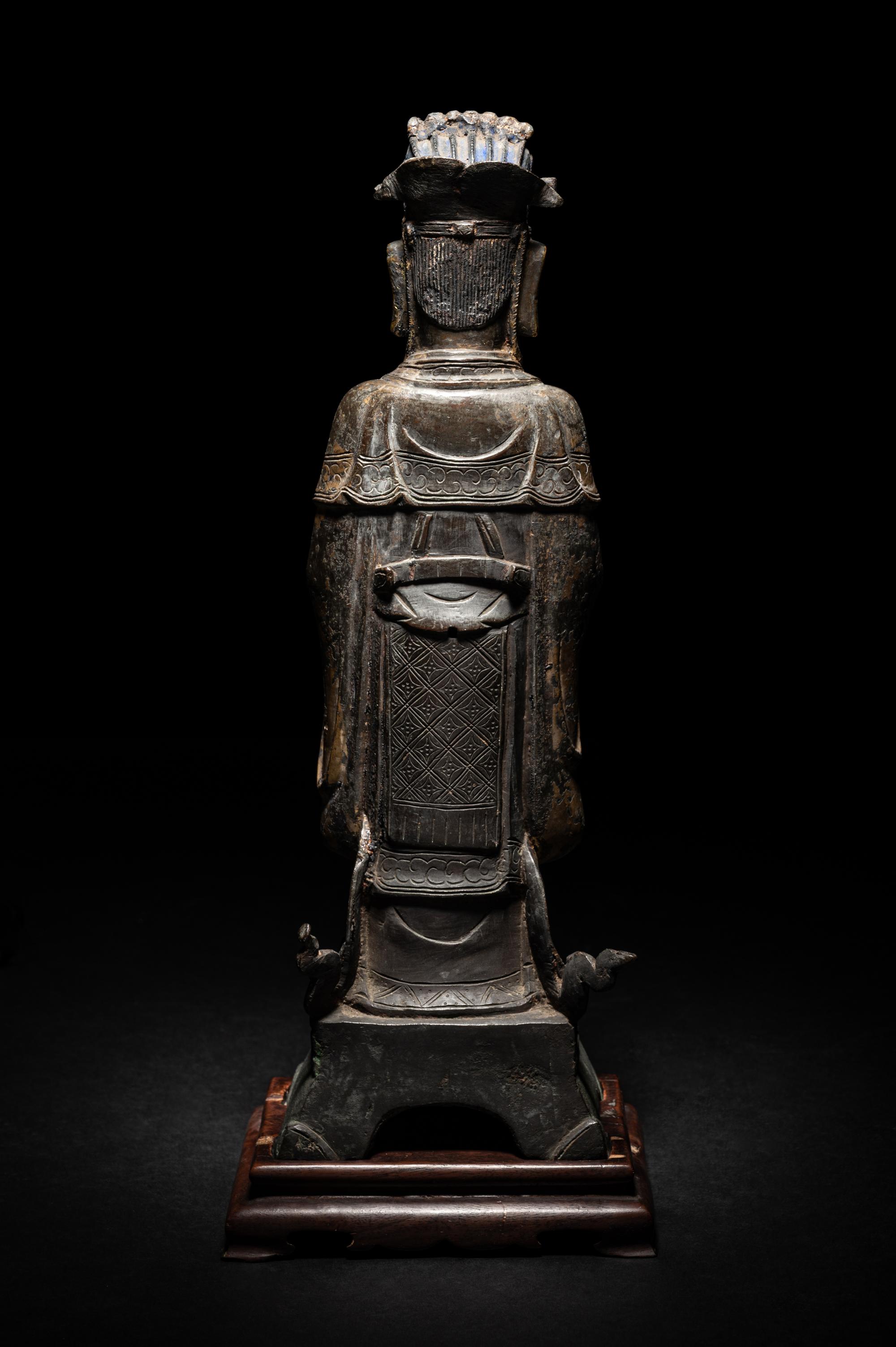A Pair of Chinese Gilt Decorated Bronze Figures of Standing Officials