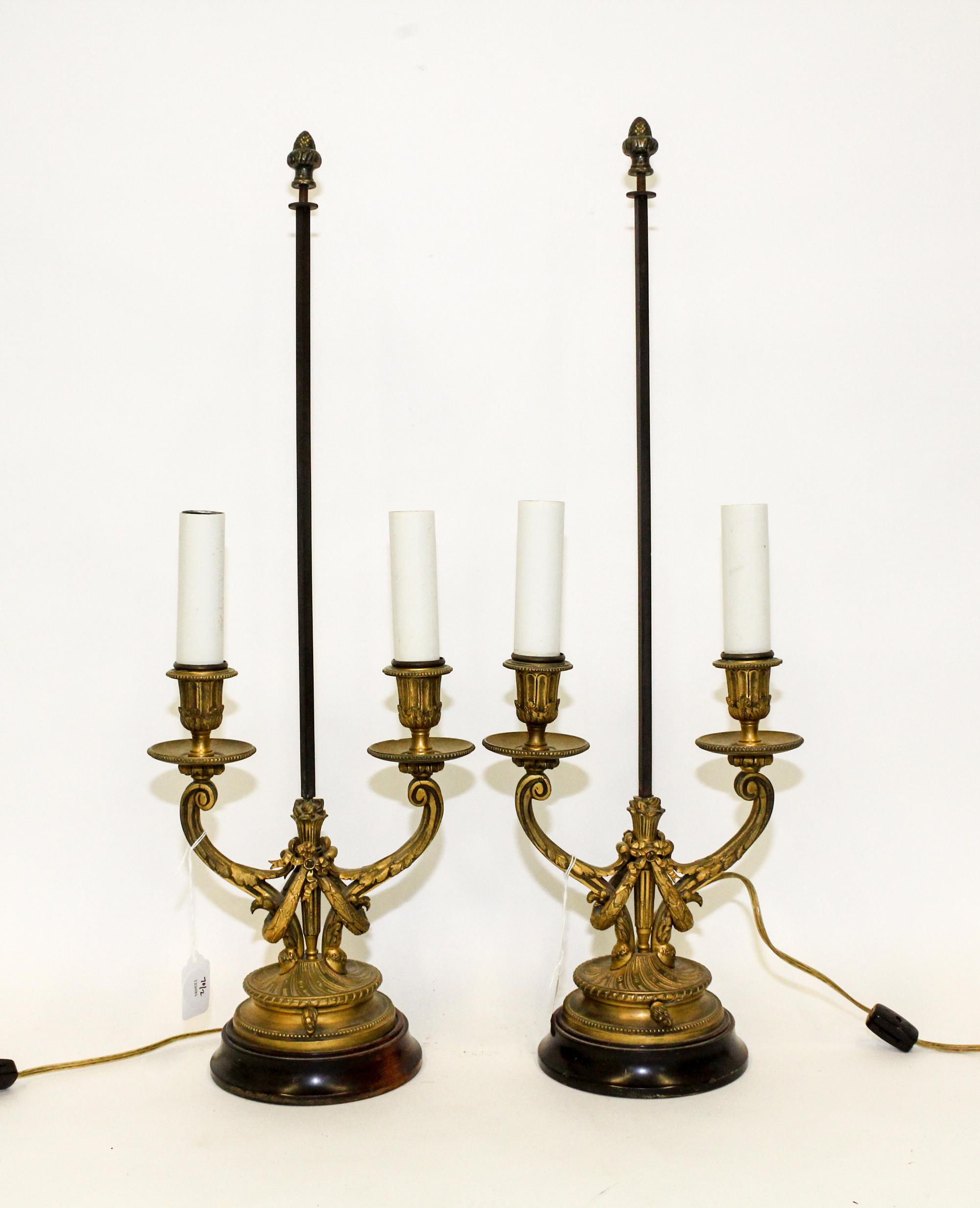 A Pair of Louis XVI Style Gilt Bronze Two-Light Candelabra Mounted as Lamps. Height 24 inches.