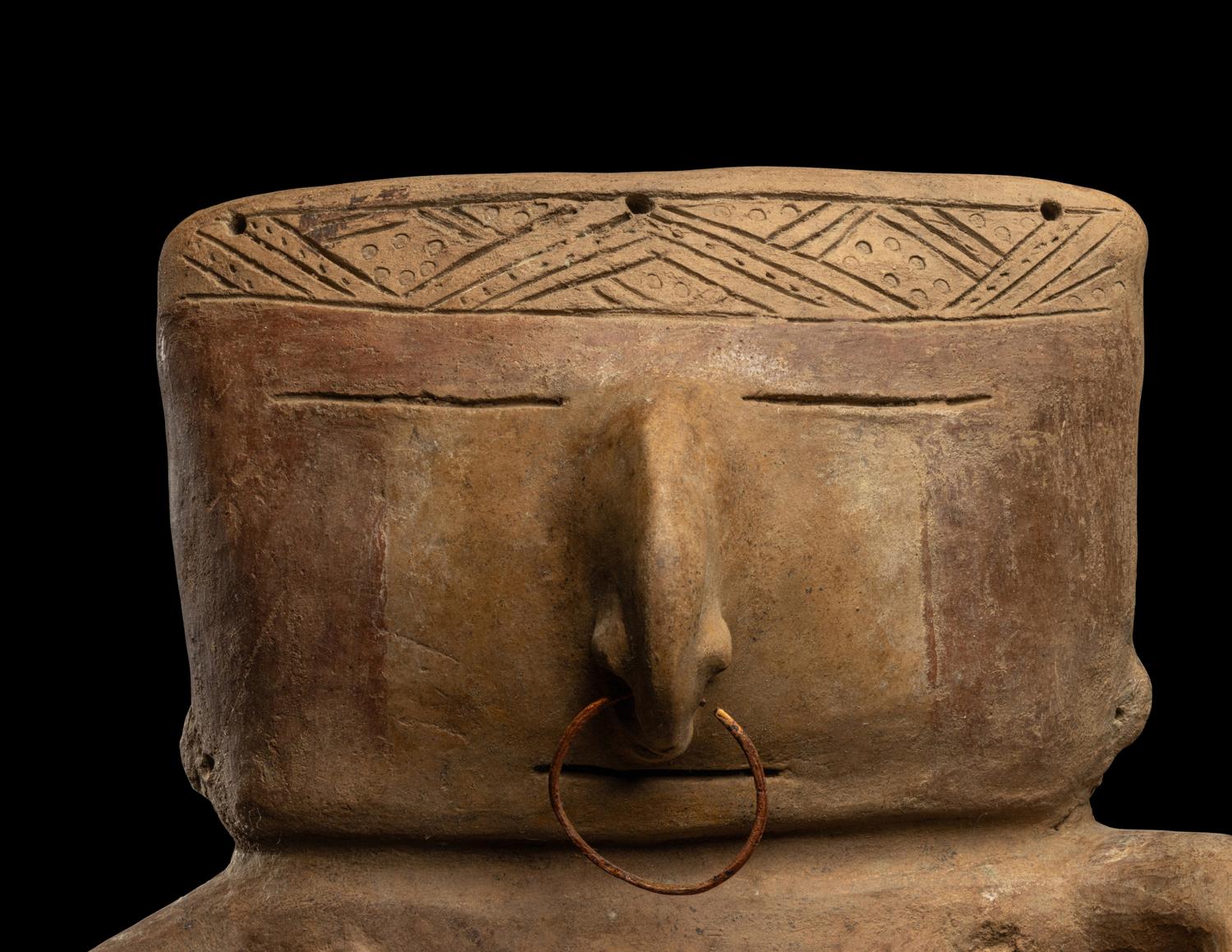 A Quimbaya Terracotta Seated Figure