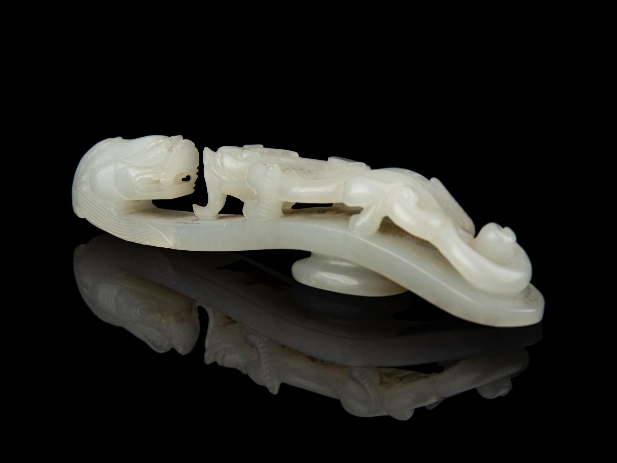 A Chinese White Jade 'Chilong' Belt Hook