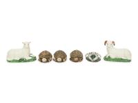 Three Ceramic Turtle-form Boxes and a Pair of Glazed Ceramic Sheep