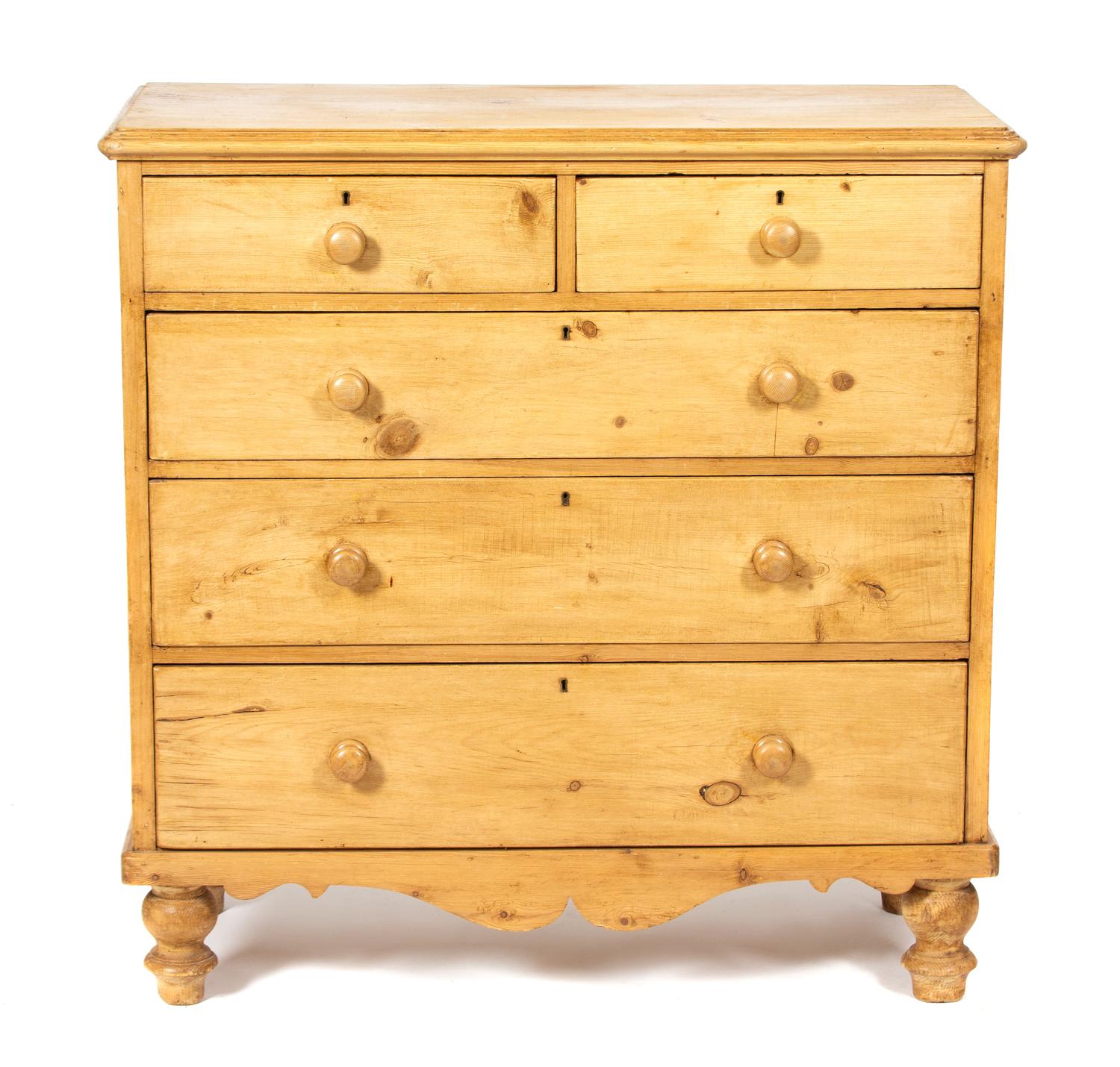 An English Pine Chest of Drawers — 20TH CENTURY