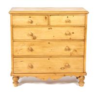 An English Pine Chest of Drawers — 20TH CENTURY
