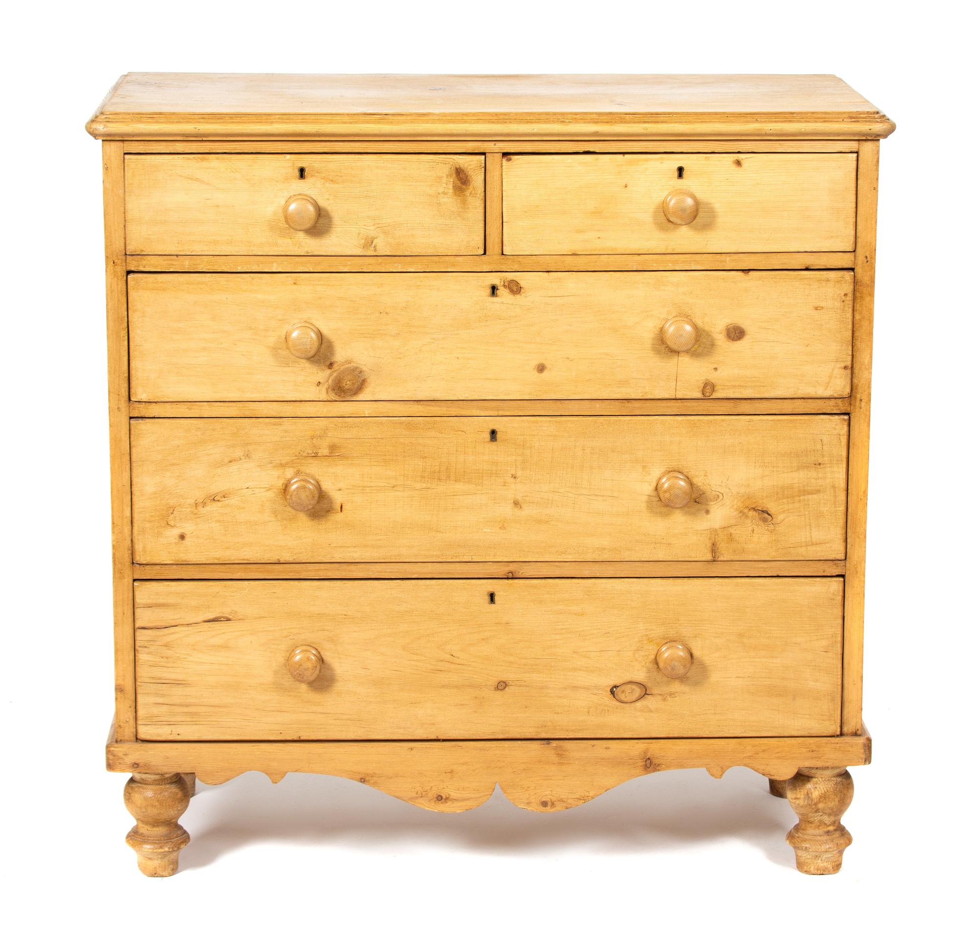 An English Pine Chest of Drawers — 20TH CENTURY