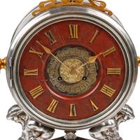A French Neoclassical Silvered and Gilt Bronze and Red Marble Clock