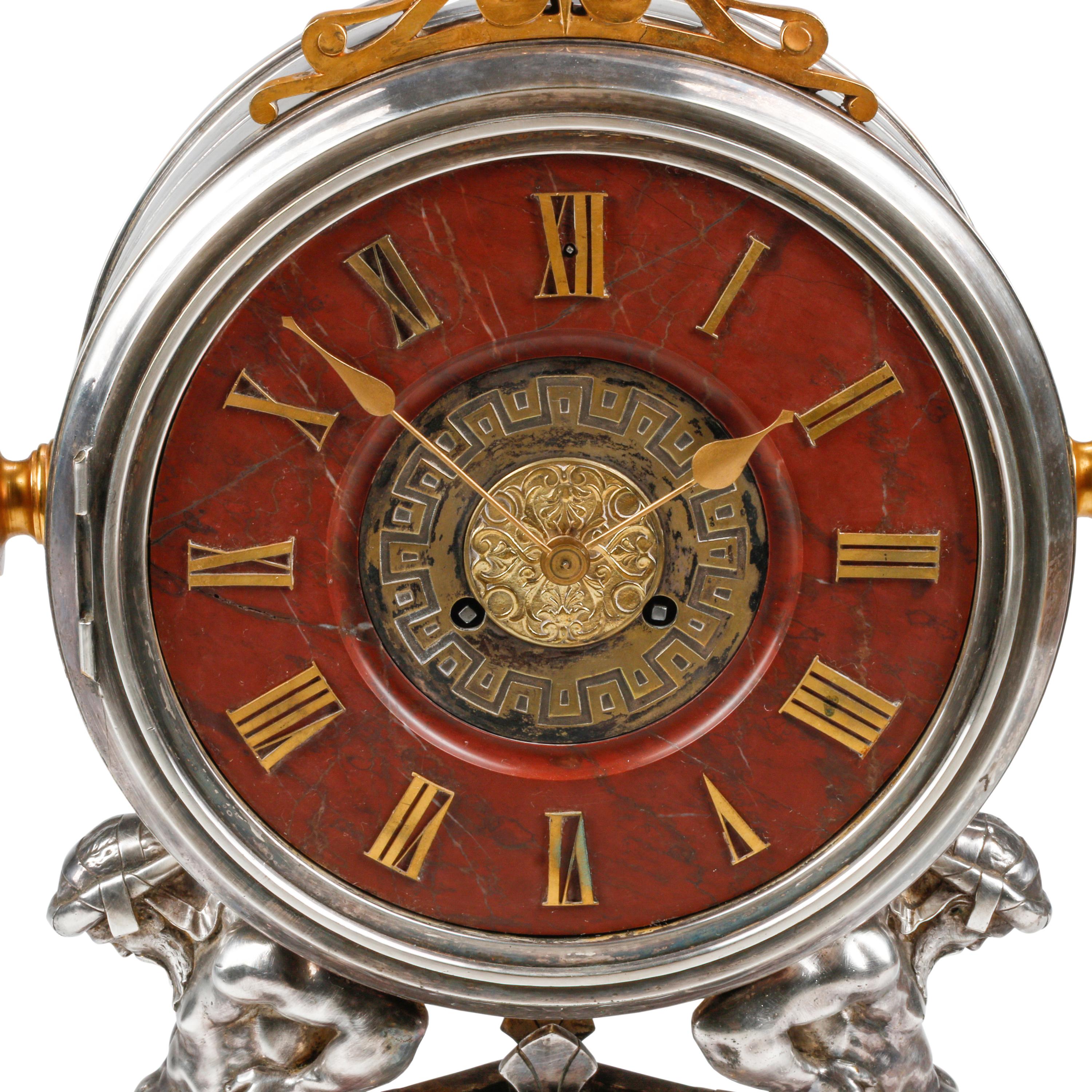 A French Neoclassical Silvered and Gilt Bronze and Red Marble Clock
