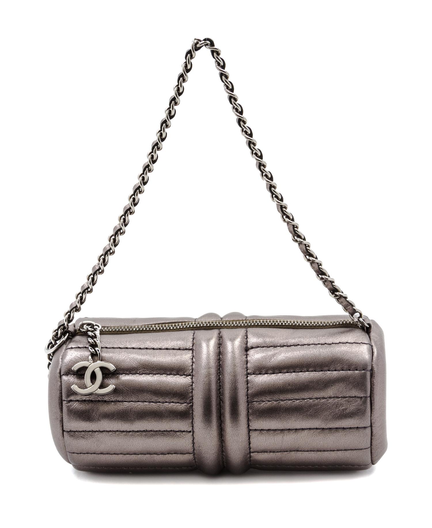 A Chanel Grey Metallic Quilted Leather Bag, 7 1/2 x 3 x 3 inches.