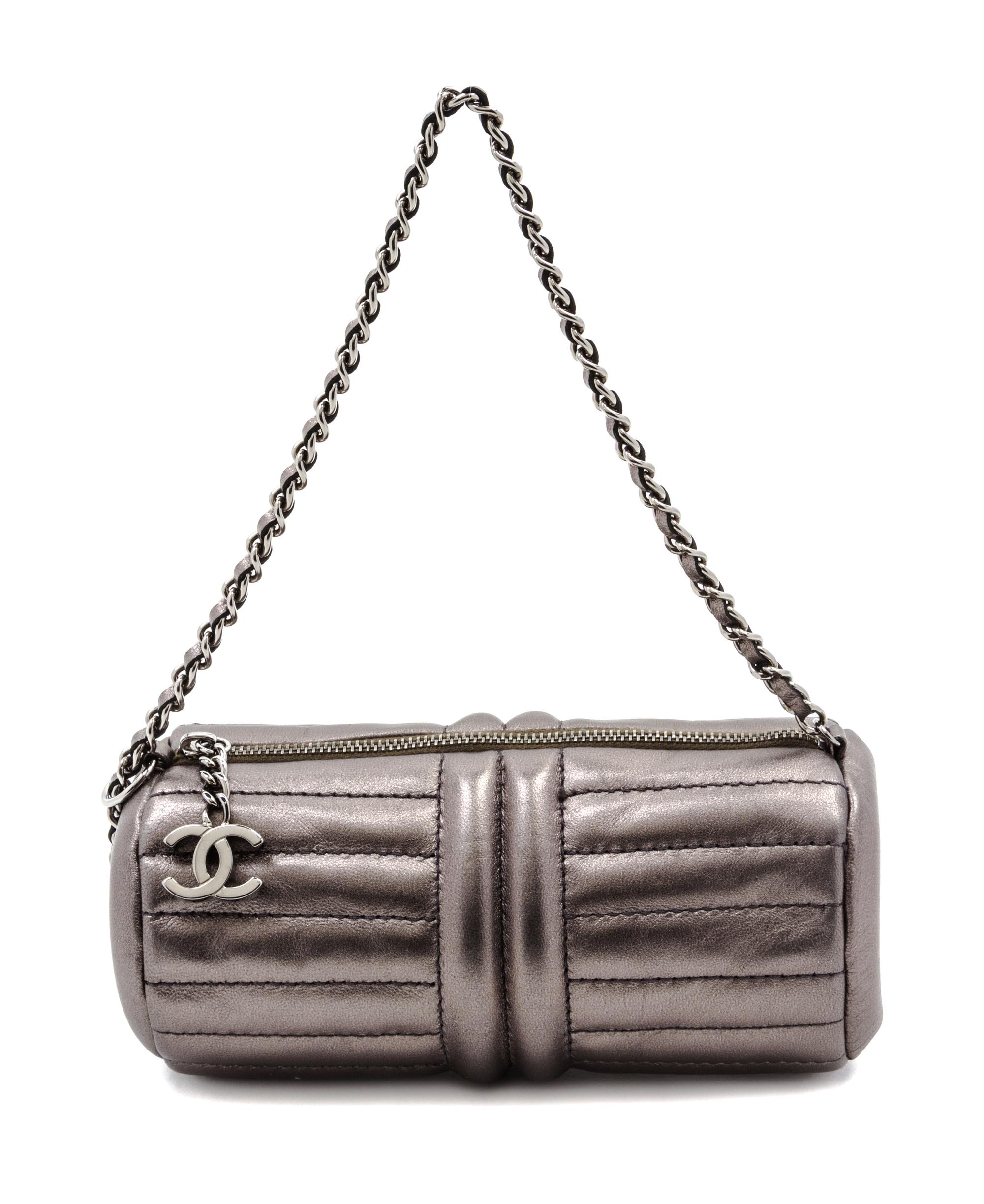 A Chanel Grey Metallic Quilted Leather Bag, 7 1/2 x 3 x 3 inches.