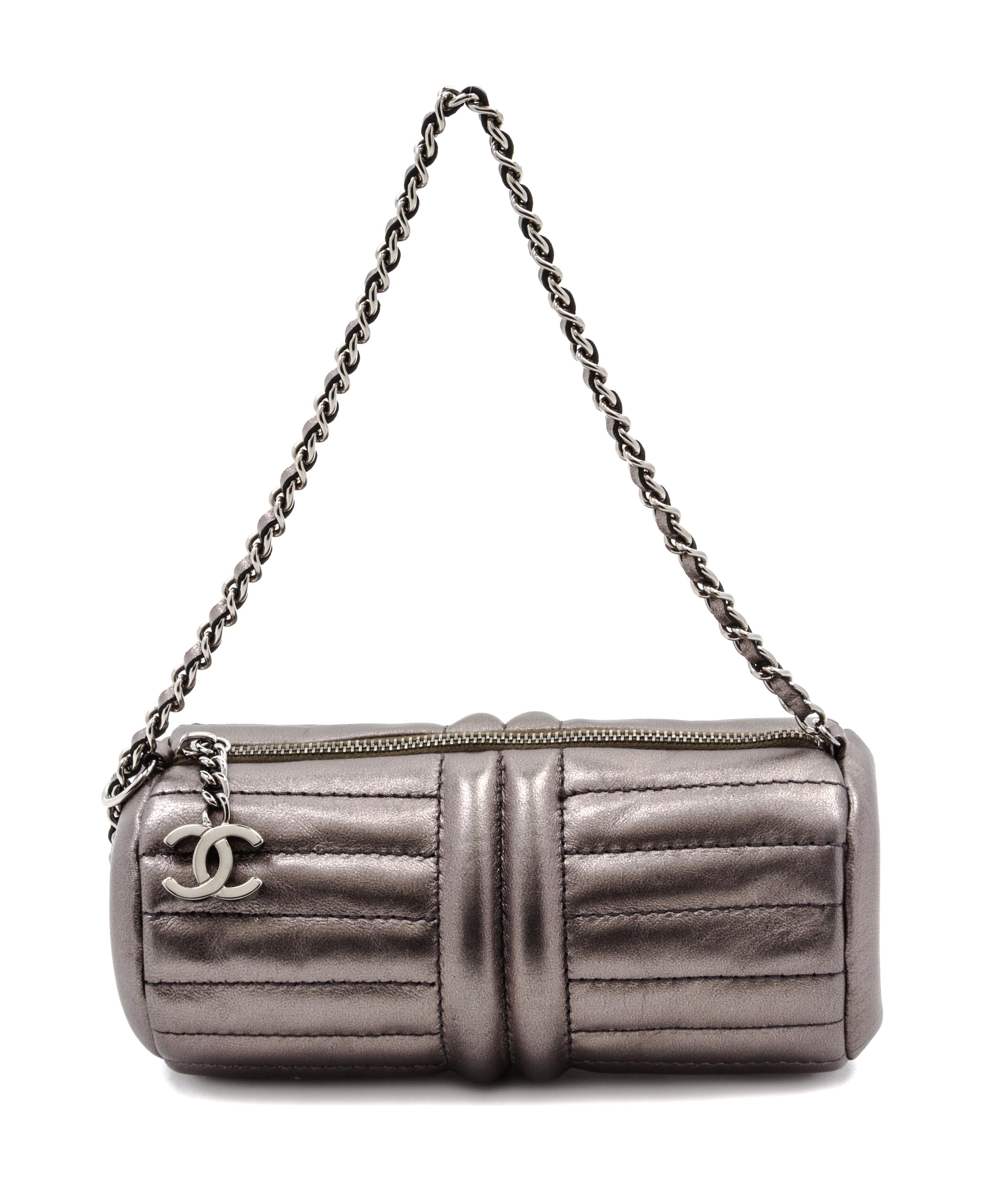 A Chanel Grey Metallic Quilted Leather Bag, 7 1/2 x 3 x 3 inches.