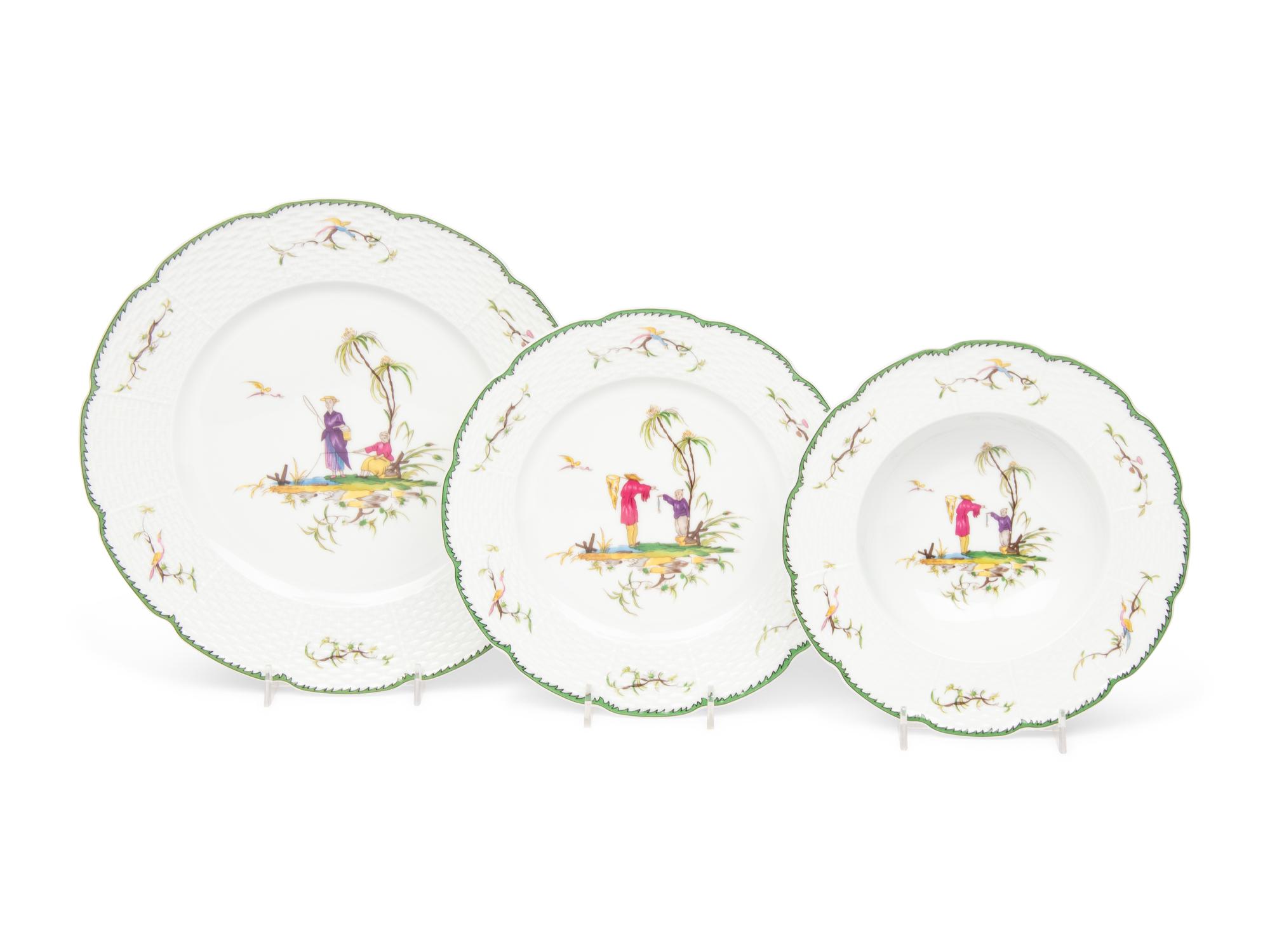 A Raynaud & Co. Limoges Porcelain Dinner Service