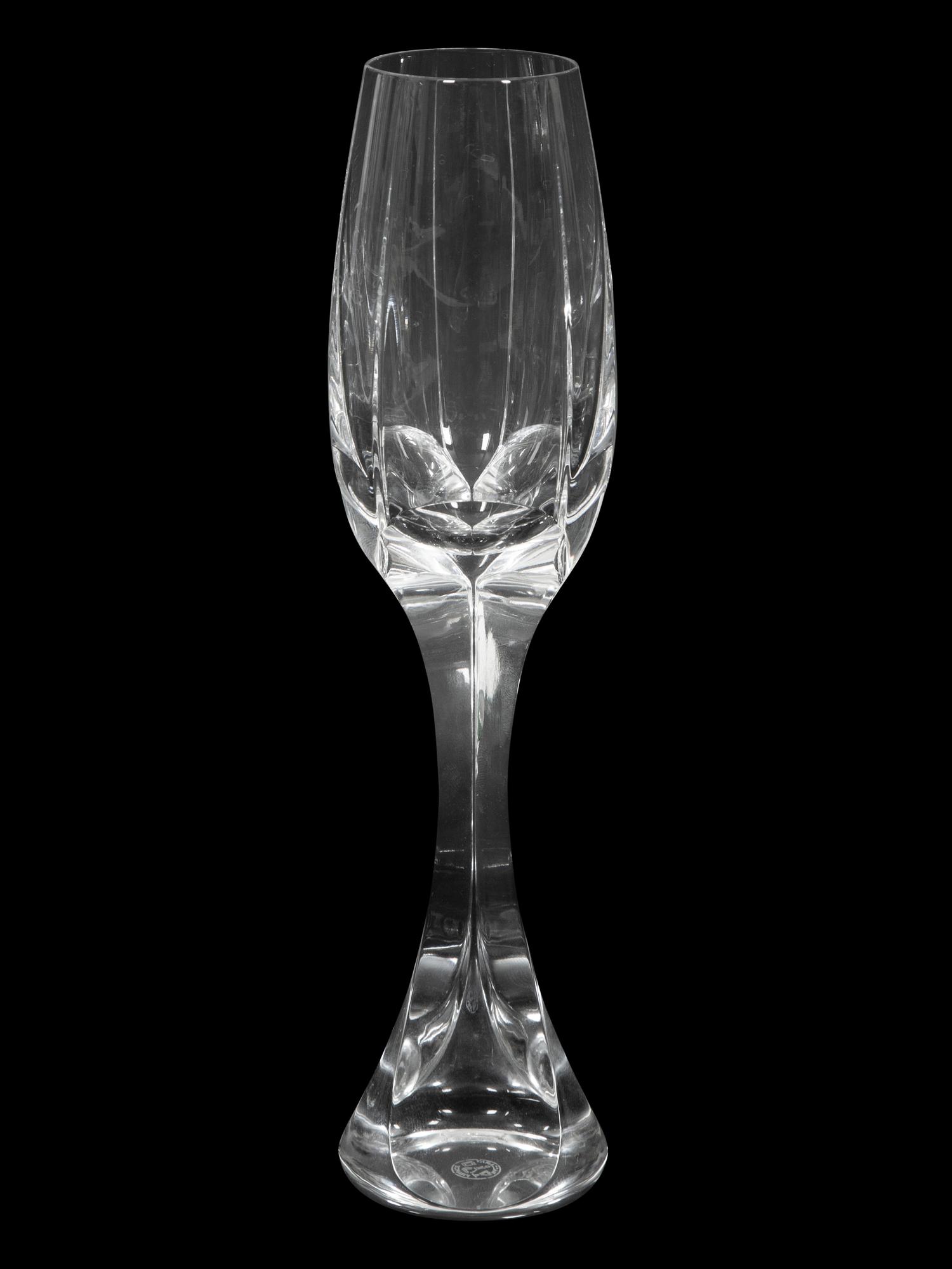 A Set of Twelve Baccarat Neptune Champagne Flutes
