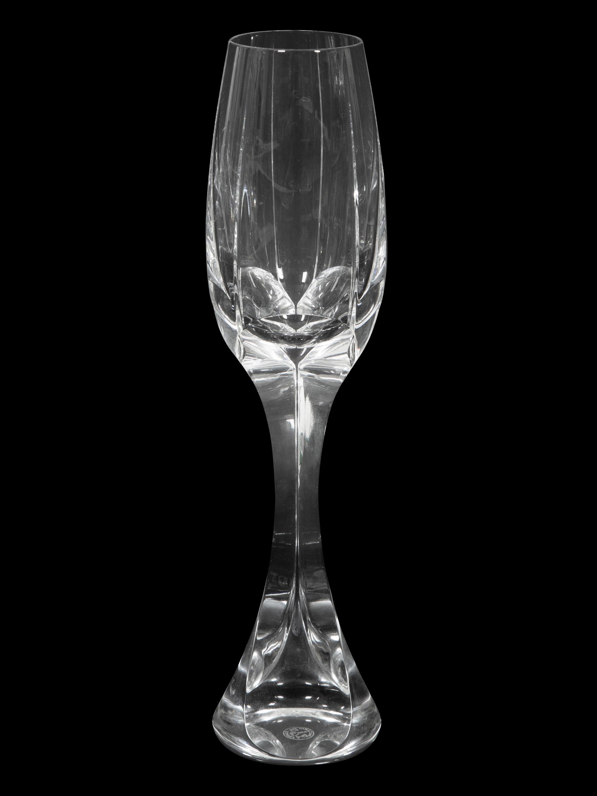 A Set of Twelve Baccarat Neptune Champagne Flutes
