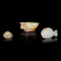 Two Chinese Jade Ornaments and A Jadeite 'Lotus Leaf' Brush Washer, Qing Dynasty 清 黃翡荷葉洗及白玉灑金把件兩枚