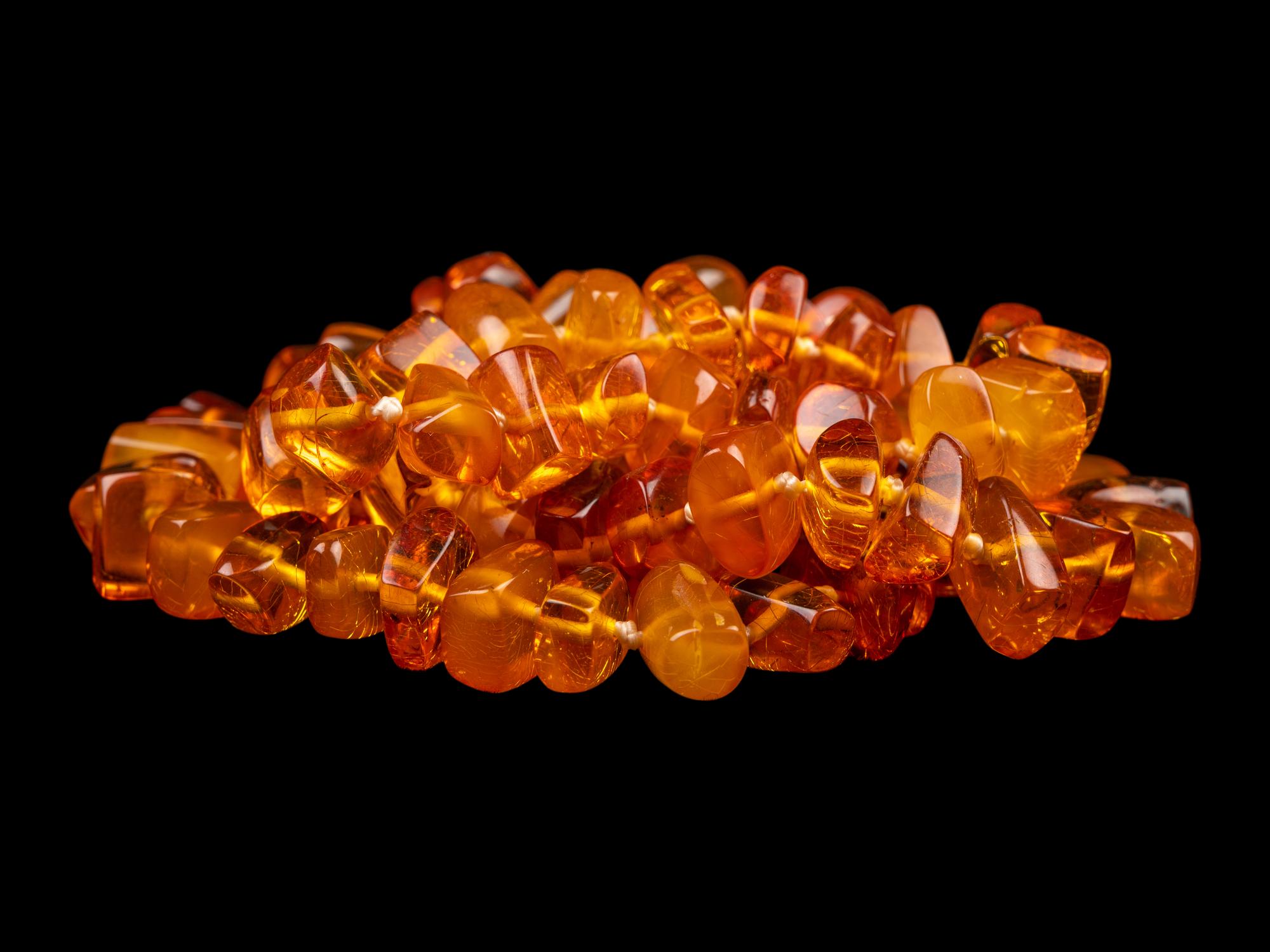 Four Chinese Beaded Amber Jewelry