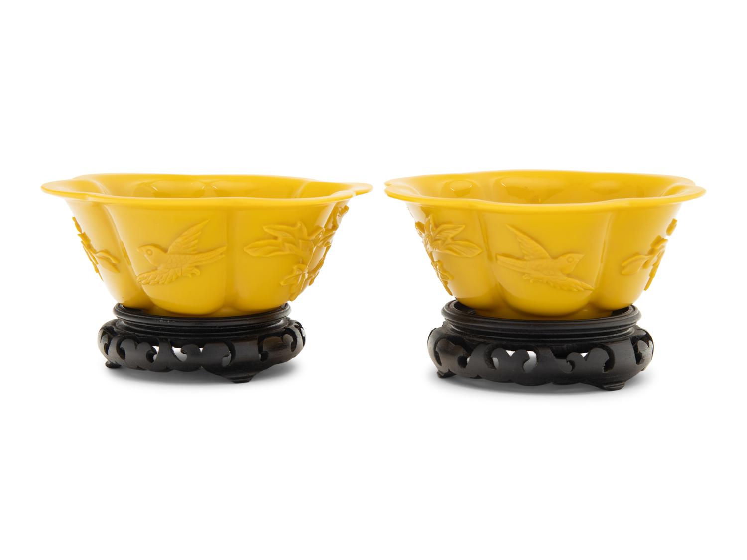 A Pair of Chinese Carved Opaque Yellow Glass Bowls