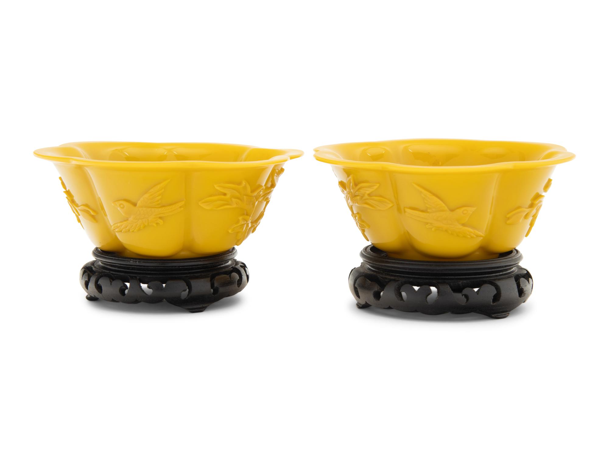 A Pair of Chinese Carved Opaque Yellow Glass Bowls