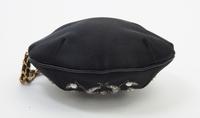 A Chanel Black Silk Embroidered Rhinestone Circular Clutch, 7" diameter.