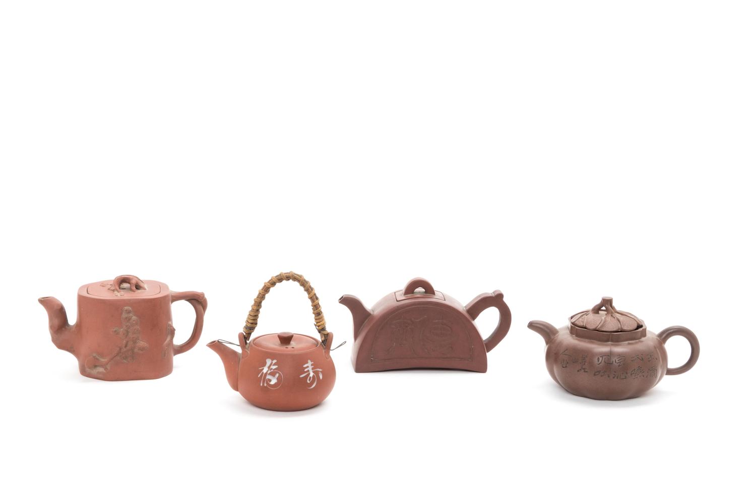Four Chinese Yixing Pottery Teapots