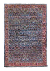 A Hereke Wool Rug 11 feet 2 inches x 7 feet 7 inches.