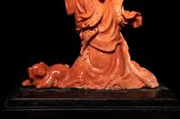 A Chinese Carved Red Coral Figure of a Female Immortal