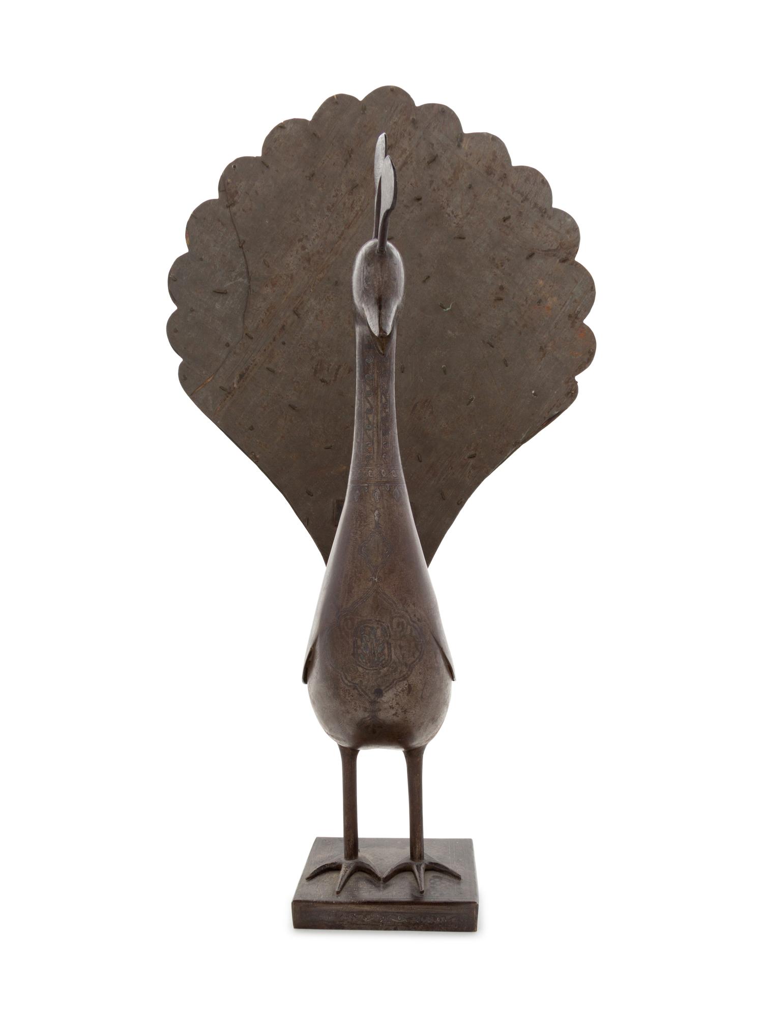 A Qajar Damascened Steel Peacock