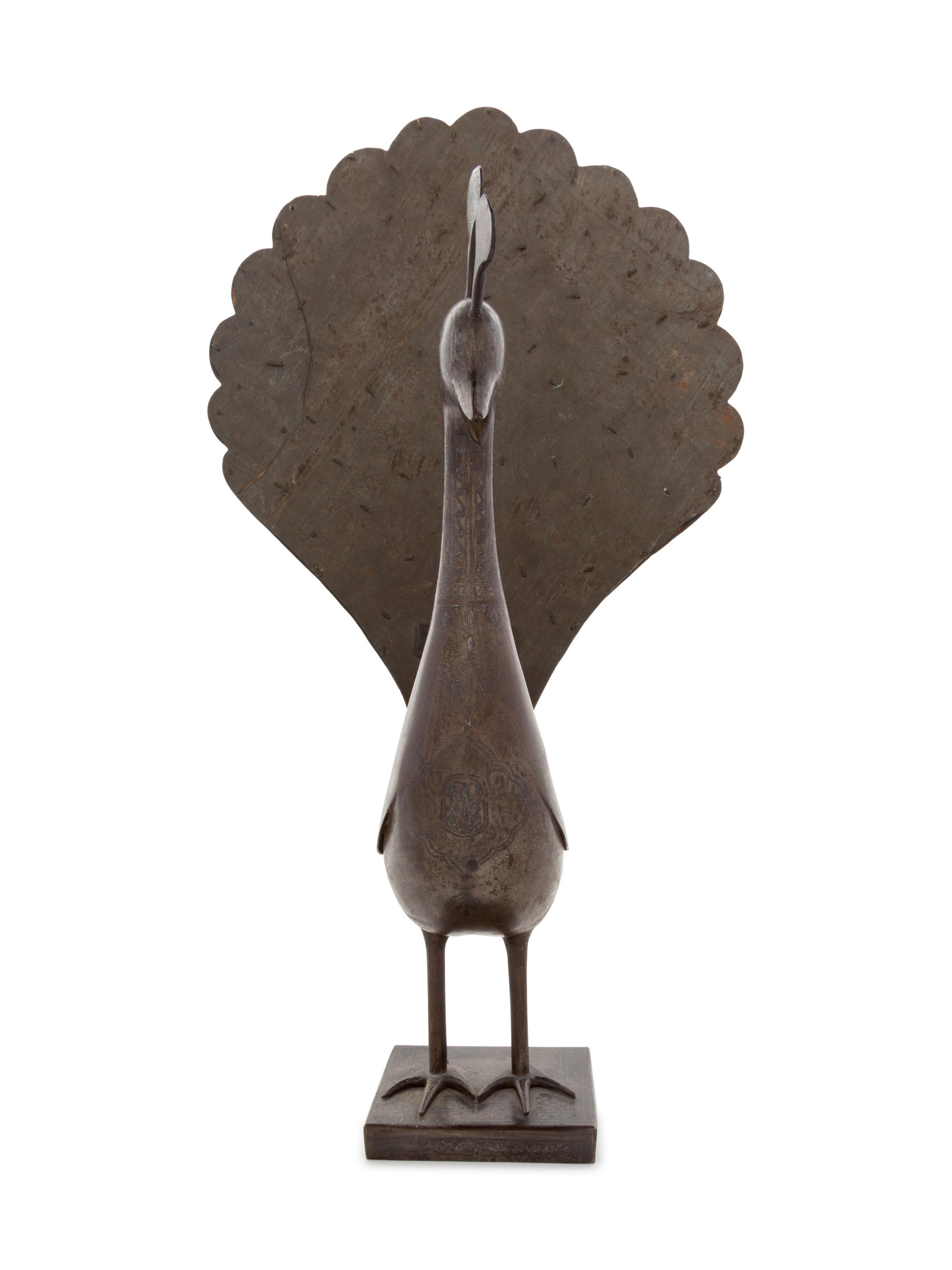 A Qajar Damascened Steel Peacock